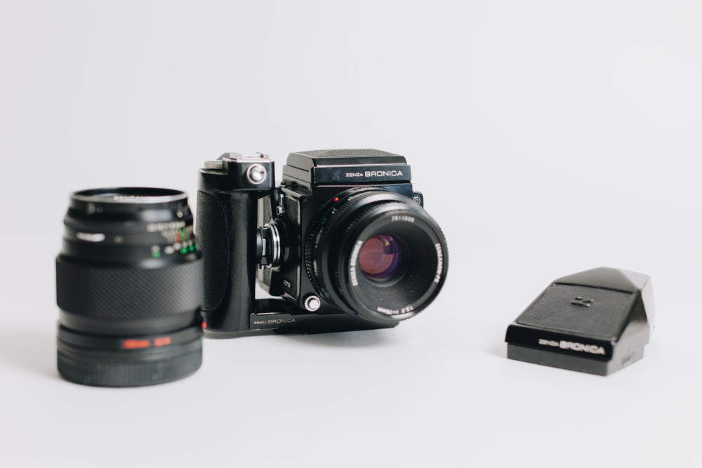Bronica Zenza with two lenses 75mm F/2.8 and 150mm F/4 waistlevel viewfidner and prism viewfinder