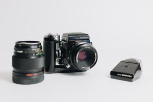 Bronica Zenza with two lenses 75mm F/2.8 and 150mm F/4 waistlevel viewfidner and prism viewfinder