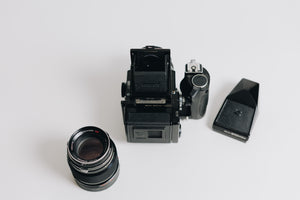 Bronica Zenza with two lenses 75mm F/2.8 and 150mm F/4 waistlevel viewfidner and prism viewfinder