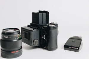 Bronica Zenza with two lenses 75mm F/2.8 and 150mm F/4 waistlevel viewfidner and prism viewfinder