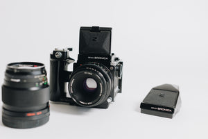 Bronica Zenza with two lenses 75mm F/2.8 and 150mm F/4 waistlevel viewfidner and prism viewfinder