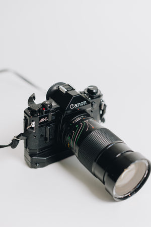 Canon A-1 with FD 28-90mm F/2.8 - 3.5 Lens with Battery Grip