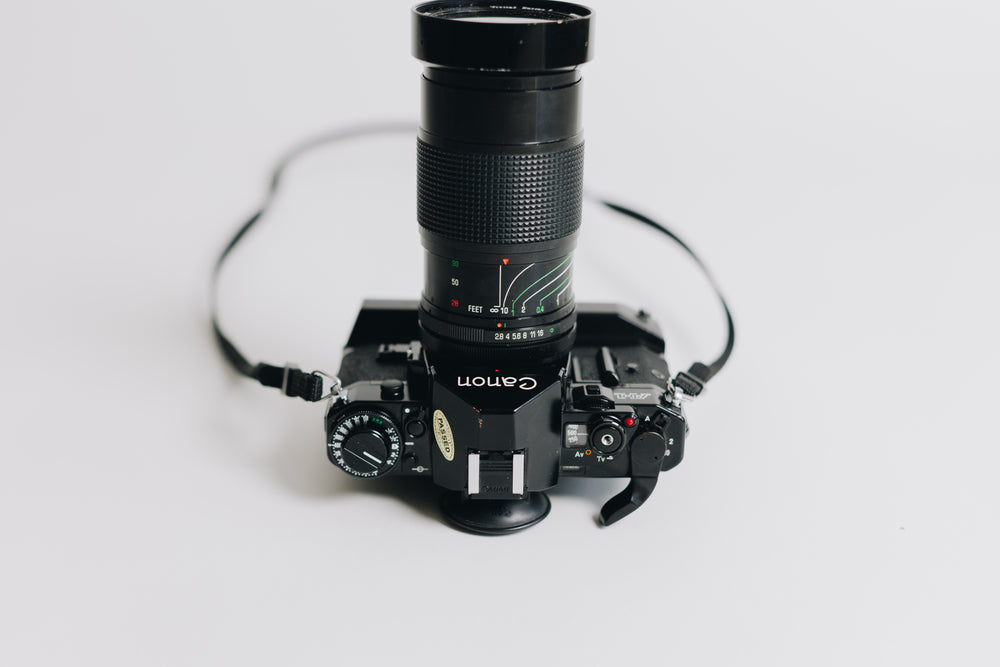Canon A-1 with FD 28-90mm F/2.8 - 3.5 Lens with Battery Grip