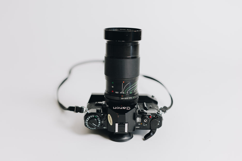 Canon A-1 with FD 28-90mm F/2.8 - 3.5 Lens with Battery Grip