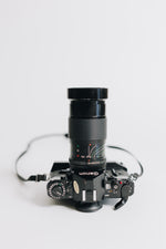 Canon A-1 with FD 28-90mm F/2.8 - 3.5 Lens with Battery Grip