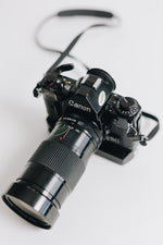 Canon A-1 with FD 28-90mm F/2.8 - 3.5 Lens with Battery Grip