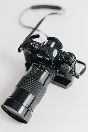 Canon A-1 with FD 28-90mm F/2.8 - 3.5 Lens with Battery Grip
