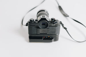 Canon A-1 with FD 28-90mm F/2.8 - 3.5 Lens with Battery Grip
