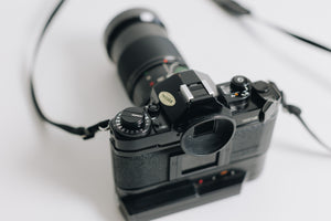 Canon A-1 with FD 28-90mm F/2.8 - 3.5 Lens with Battery Grip